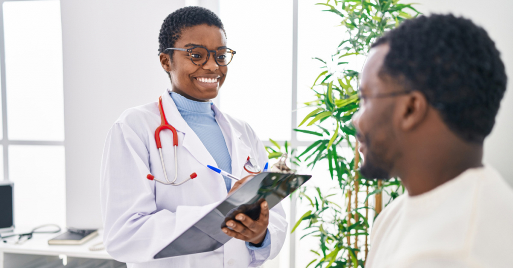 Man and woman doctor and patient having medical consultation speaking at clinic